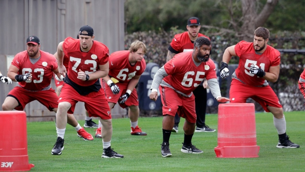 The Atlanta Falcons go through drills during practice for the Super Bowl