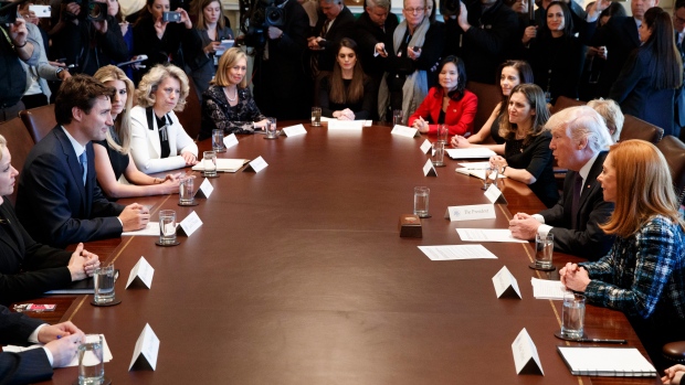 Donald Trump and Justin Trudeau meet with women business leaders at the White House Feb. 13, 2017. 