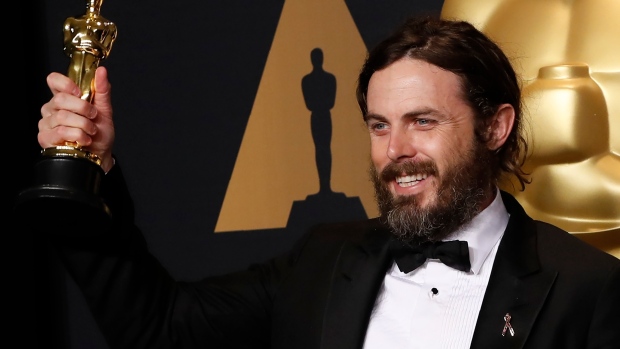 Casey Affleck poses with his Oscar for Best Actor for "Manchester by the Sea." 