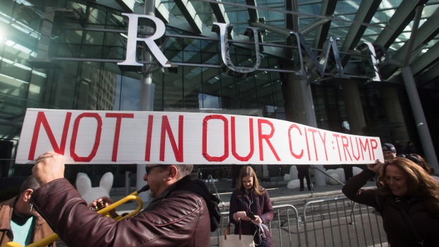 Protesters  outside the official opening of the Trump International Hotel and Tower in Vancouver