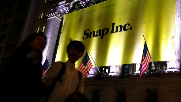 A Banner for Snap Inc. hangs on the facade of the the New York Stock Exchange (NYSE) on the eve of 