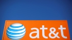 An AT&T sign is seen outside a branch in Rolling Meadows article image