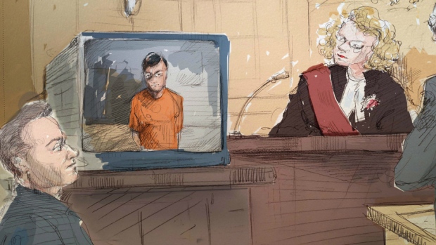 Left to right: Defence lawyer Amedeo Dicarlo, Karim Baratov via video link and Justice Kim Carpenter