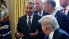 TransCanada CEO Russell K. Girling speaks to President Donald Trump in the Oval Office
