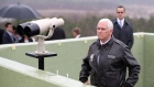 Mike Pence looks at the North side from Observation Post Ouellette in the Demilitarized Zone