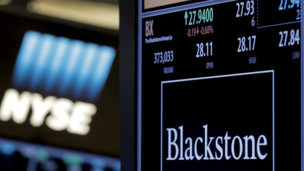 Blackstone Group trading info is displayed at its post on the NYSE floor