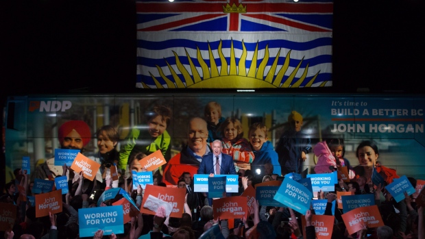 NDP Leader John Horgan addresses supporters in Vancouver, B.C.,