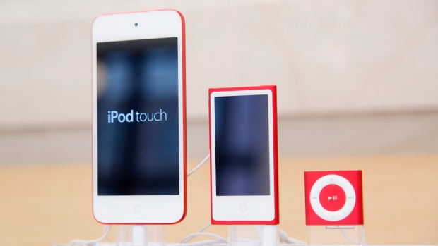In this June 11, 2015, file photo, from left, an iPod, iPod Nano and iPod Shuffle are displayed