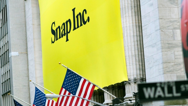 A banner for Snap Inc. hangs from the front of the New York Stock Exchange