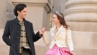 Actors Leighton Meester, right, and Penn Badgley are shown on the set of "Gossip Girl" at the Metrop
