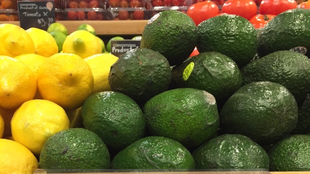 Whole Foods signage promoting cheaper avocados
