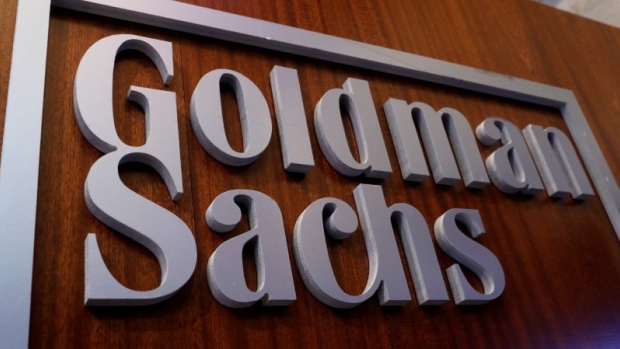 A Goldman Sachs sign is displayed inside the company's post on the floor of the NYSE