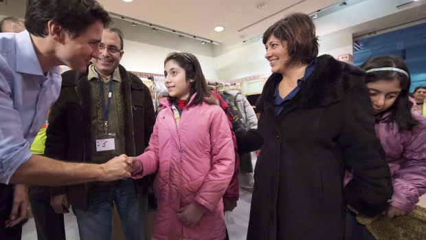 Justin Trudeau greets newly-arrived Syrian refugees