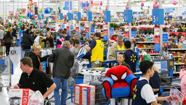 Customers shopping at Wal-Mart's Black Friday event on Thursday, Nov. 23, 2017 in Bentonville, Ark. 