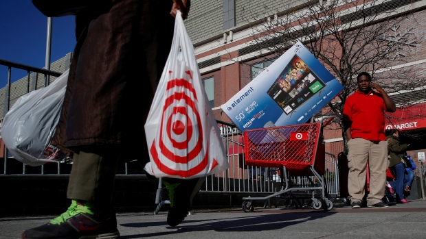 FILE PHOTO: Shoppers exit a Target store during Black Friday shopping in the Brooklyn borough of New York
