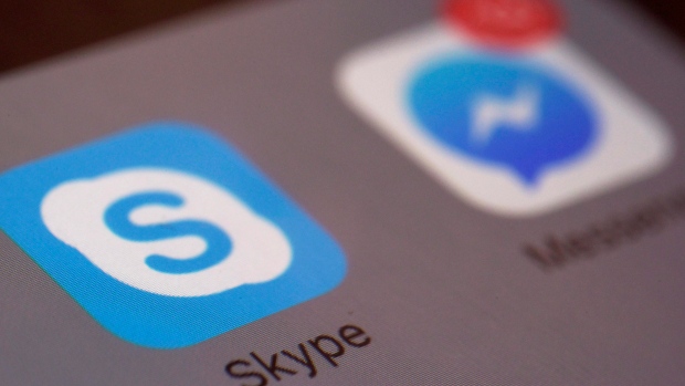 the icons for Microsoft's Skype and Facebook's Messenger apps on a smartphone 