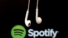 FILE PHOTO - Headphones are seen in front of a logo of online music streaming service Spotify in this illustration picture