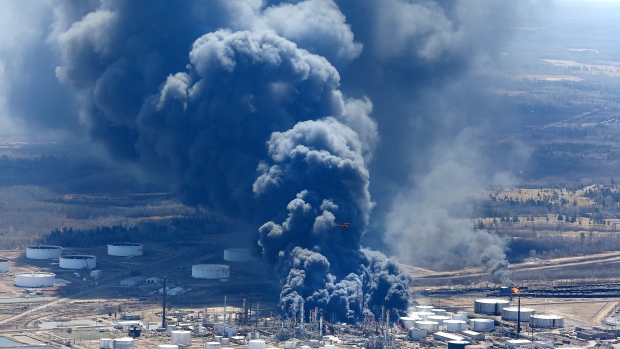 Dark smoke rises from Husky Energy oil refinery following an explosion in Superior, Wisconsin, U.S.,