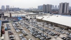 Vehicles at a used-car sales lot in this aerial photograph taken in Shanghai, China, on Wednesday, Jan. 6, 2021. 