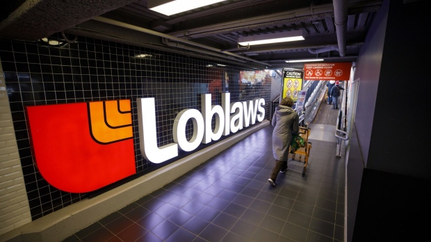 A shopper enters a Loblaw grocery store in Toronto, Ontario.