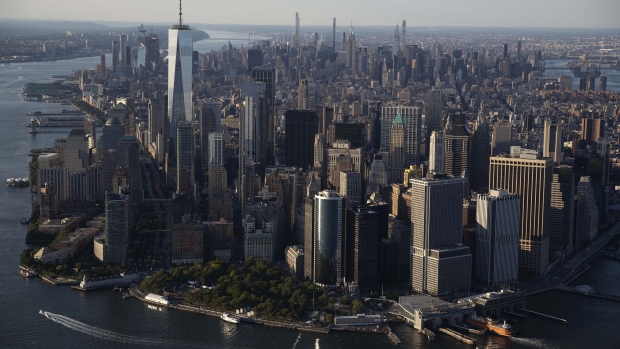 Buildings in lower Manhattan in New York, U.S., on Thursday June 17, 2021. New York state's pandemic mandates were lifted last week, after 70% of the adult population has now been given at least one dose of a coronavirus vaccine. Photographer: Victor J. Blue/Bloomberg