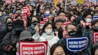 <p>Demonstrators protest against a government plan to increase the number of seats at medical schools in Seoul, on March 3.</p>
