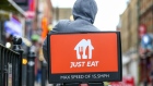 <p>A Just Eat courier in London.</p>