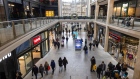 Shoppers pass through a shopping centre in Edinburgh, UK, on Wednesday, April 3, 2024. UK companies expect to raise their own prices by the least in almost 2 1/2 years, a further sign that an unwinding of inflationary pressures is gathering momentum.