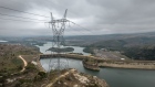 <p>Power lines over the Centrais Eletricas Brasileiras hydroelectric dam in Furnas, Brazil.</p>