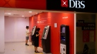 Customers use ATMs at a DBS Group Holdings Ltd. bank branch in Singapore, on Wednesday, Feb. 7, 2024. DBS's fourth-quarter profit came in short of analyst expectations amid signs of pressure on margins. Photographer: Suhaimi Abdullah/Bloomberg