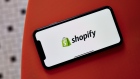The Shopify logo on a smartphone. Photographer: Gabby Jones/Bloomberg
