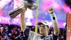 Tom Brady lifts the Vince Lombardi Trophy after Super Bowl XLIX in 2015