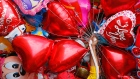 A vendor sells balloons on Valentine's Day, Tuesday, Feb.14, 2017,