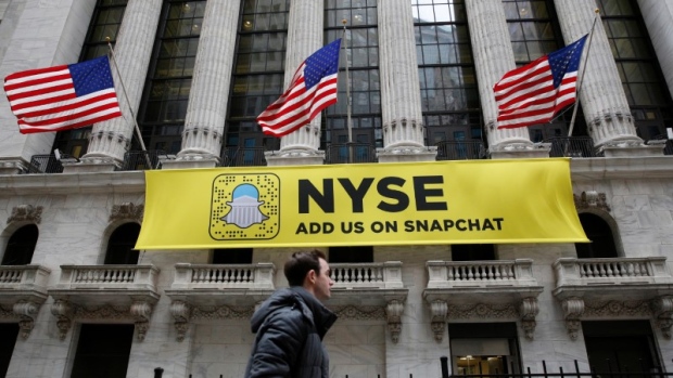 A Snapchat sign hangs on the facade of the New York Stock Exchange (NYSE) in New York City