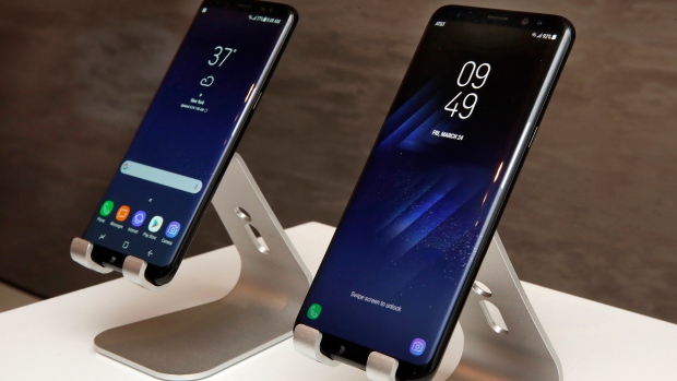 New Samsung Galaxy S8, left, and Galaxy S8 Plus mobile phones are displayed in New York. 