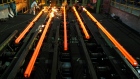 Employees work in a Hangzhou Iron and Steel Group Company workshop in Hangzhou, Zhejiang province. 