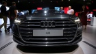 Attendees view the Audi A8 at the Audi Summit in Barcelona, Spain July 11, 2017