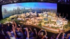 Members of the media get their first look at a 50-foot, detailed model of "Star Wars" land