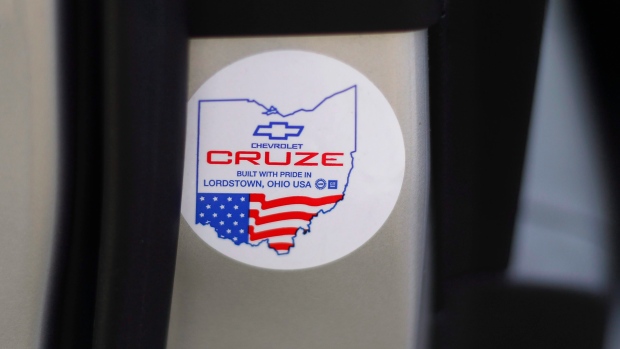 A sticker on a Chevrolet Cruze promotes its 'Buy American' compliance.