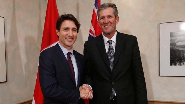 Prime Minister Justin Trudeau (L) meets with Manitoba Premier Brian Pallister