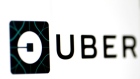 The Uber logo is seen on a screen in Singapore August 4, 2017. 