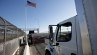 Trucks wait in the queue for border customs control to cross into U.S. at the Bridge of Americas
