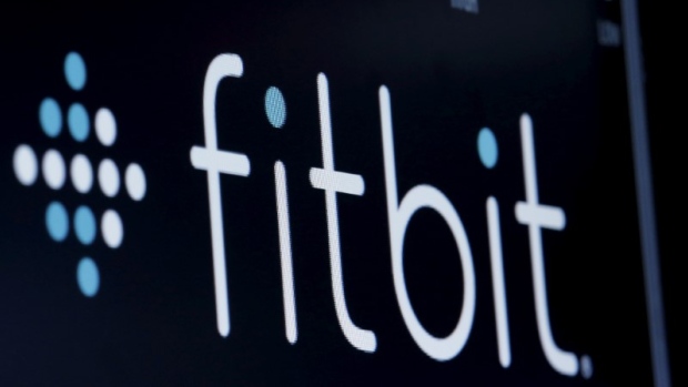 The ticker symbol for Fitbit is displayed at the post where it is traded on the floor of the NYSE