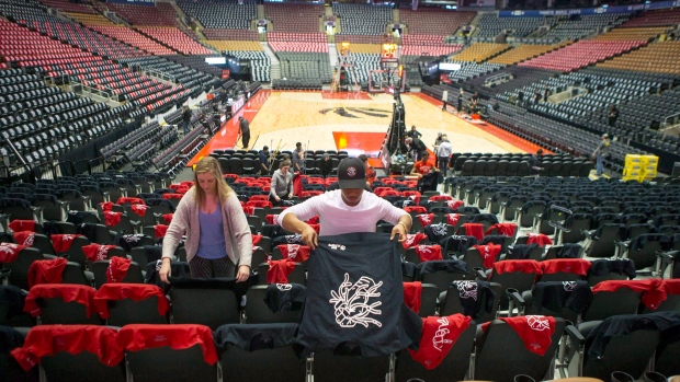 T-shirts are laid out on the seats of the Air Canada Centre