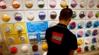 A Lego employee sorts Legos at one of the toy company's stores in Paris, France