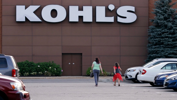 Shoppers walk to a Kohl's retail store in Salem, New Hampshire