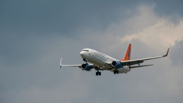 A Sunwing Boeing 737-800 passenger plane prepares to land.