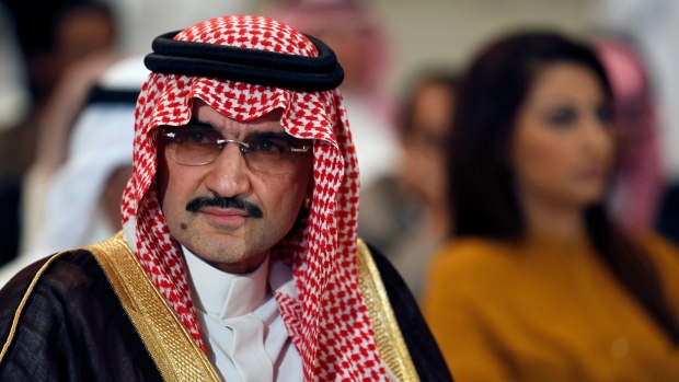 Saudi billionaire Prince Alwaleed bin Talal looks on during a news briefing in Manama, May 8, 2012