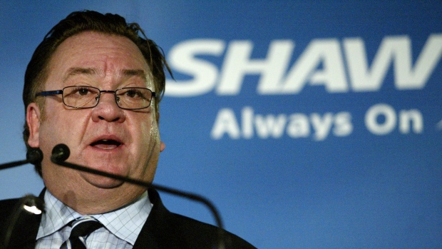 Shaw Communications Chief Executive Officer Jim Shaw speaks in 2004